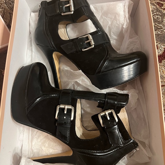 Michael Kors patent leather platform heels. Buckles and ankle height. 
Size 7M - Picture 15 of 16